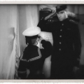 Курсант-нахимовец отдает честь преподователю-офицеру, 1945 год